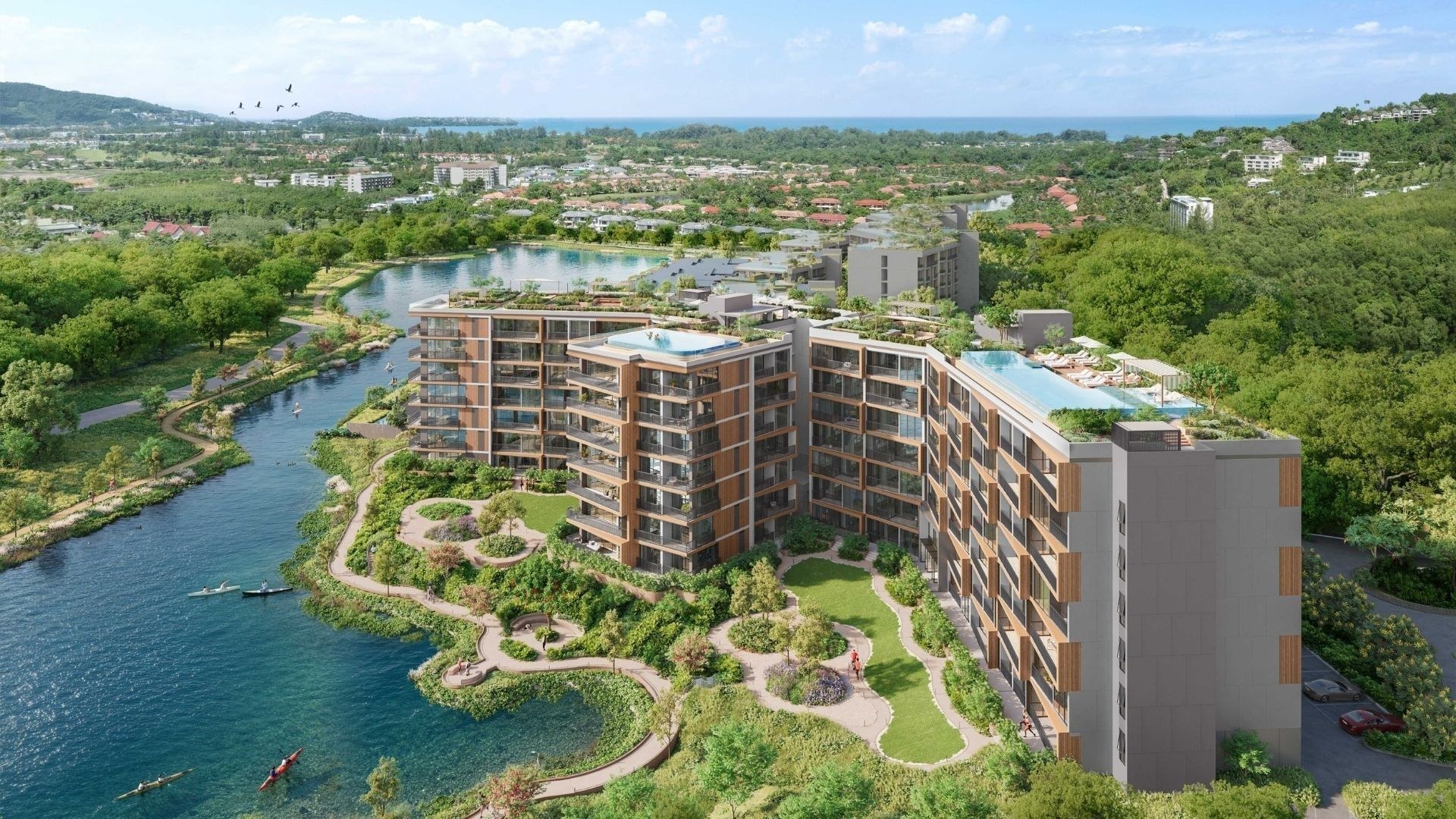 A rendering of a Laguna Lakelands residence building beside lakes and gardens near Laguna Phuket