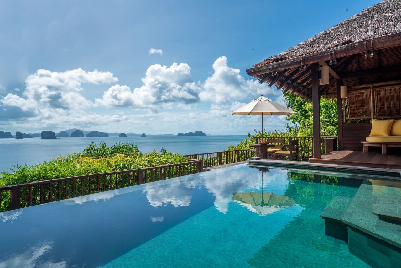 A villa pool at Six Senses Yao Noi facing the limestone islands of Phang Nga Bay